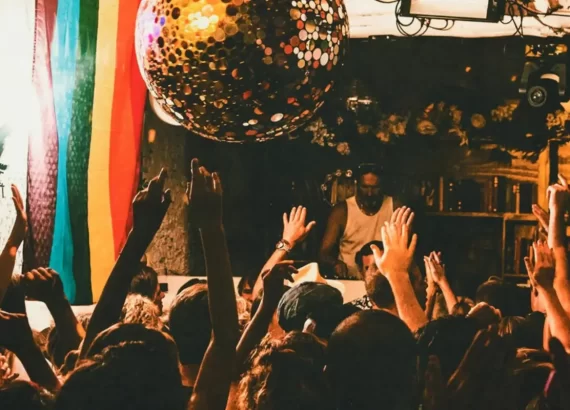 The cover image for the best disco in Ibiza blog, which shows the giant disco ball and people dancing at Freddies at Pikes