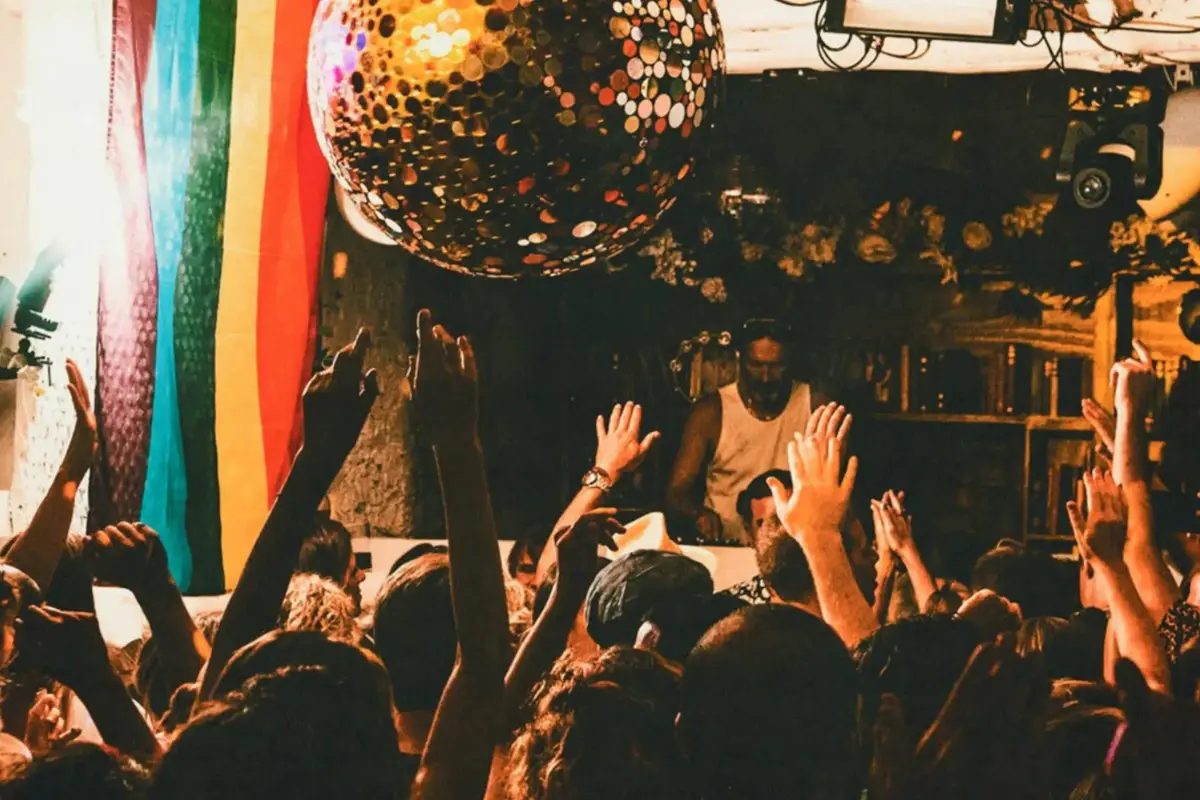 The cover image for the best disco in Ibiza blog, which shows the giant disco ball and people dancing at Freddies at Pikes