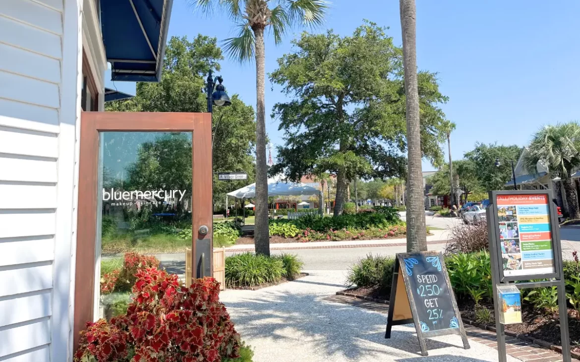 A storefront at a sunny and welcoming Fresh Fields Village 